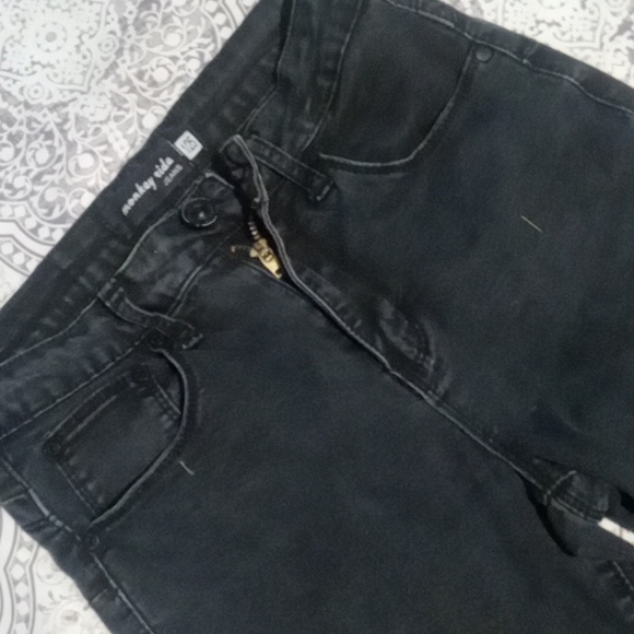 black slightly distressed skinny jeans - Picture 12 of 13